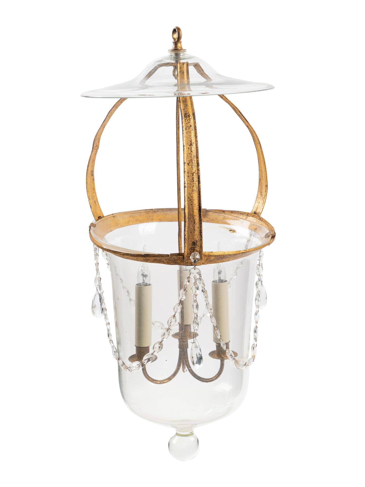 A Regency Style Gilt Metal and Glass Three-Light Lantern