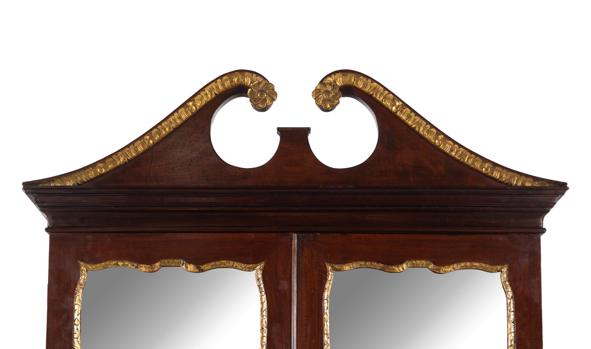 A George II Parcel Gilt Mahogany Secretary Bookcase