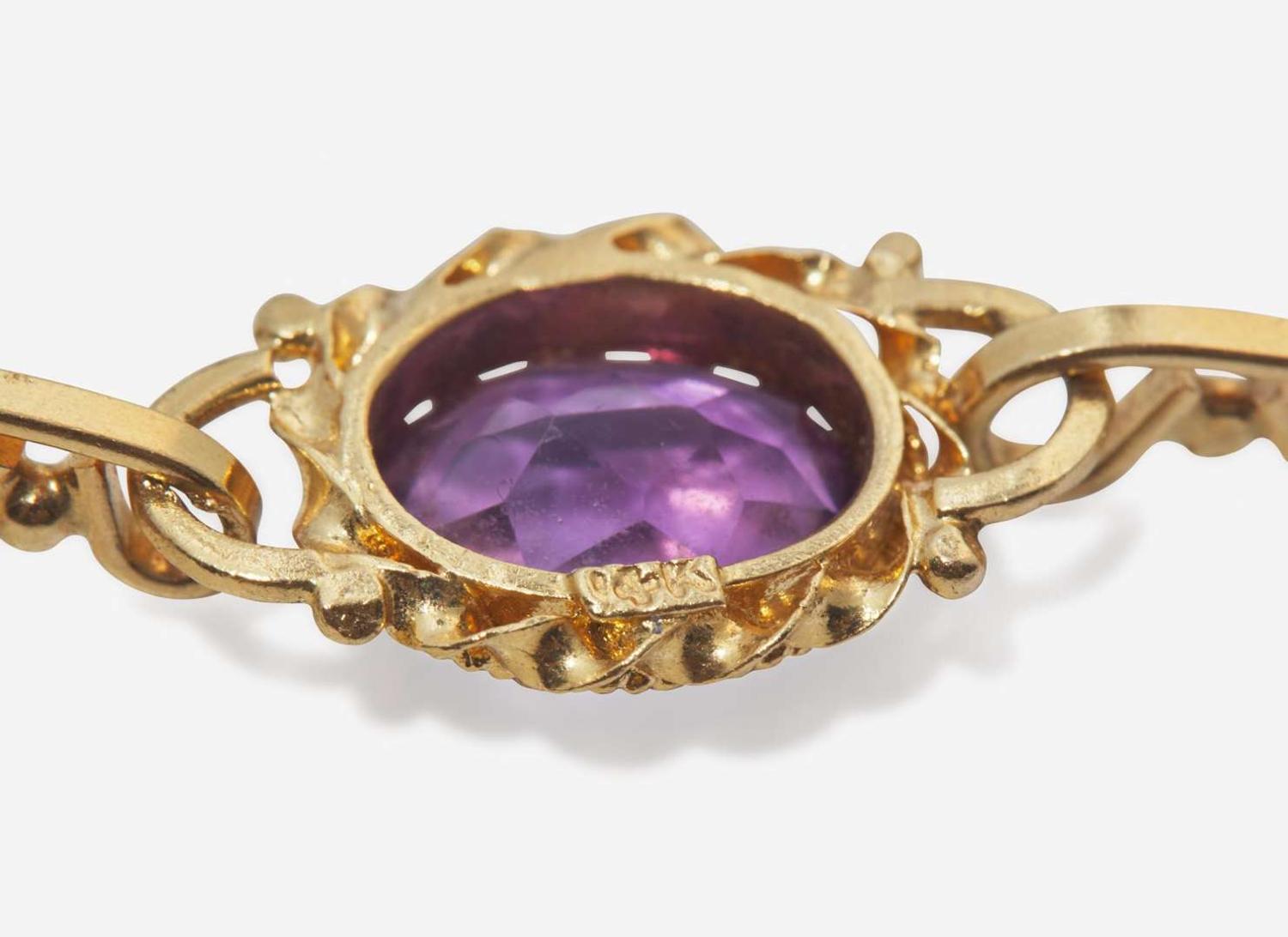 A Collection of 14K Yellow Gold and Amethyst Jewelry