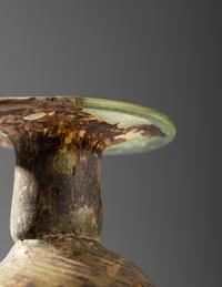 A Roman Green Glass Bottle