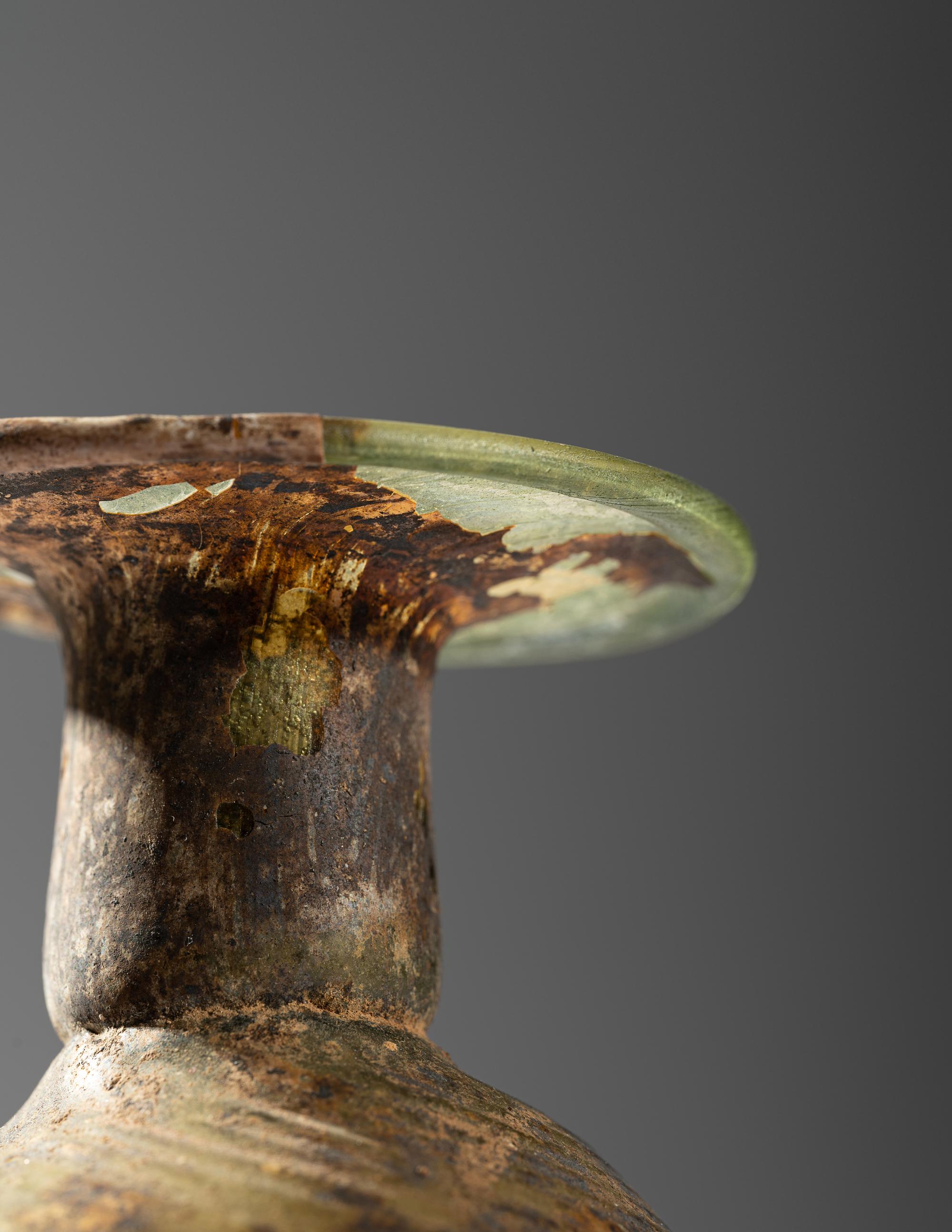A Roman Green Glass Bottle
