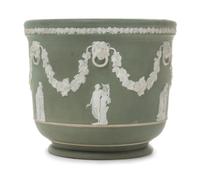 A Wedgwood Jasperware Jardiniere Height 7 1/8 x diameter 8 inches.
