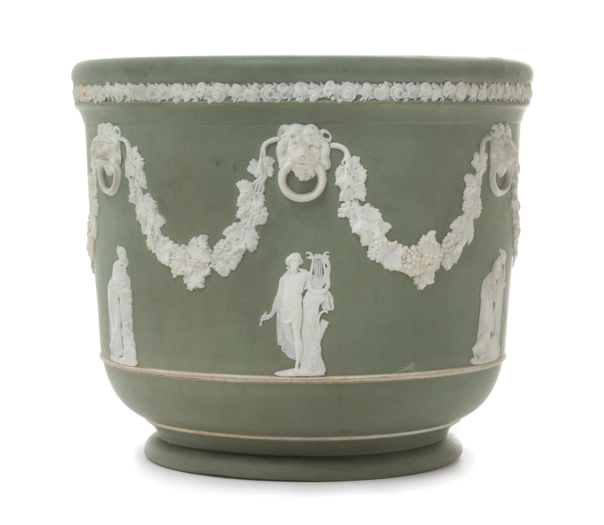A Wedgwood Jasperware Jardiniere Height 7 1/8 x diameter 8 inches.