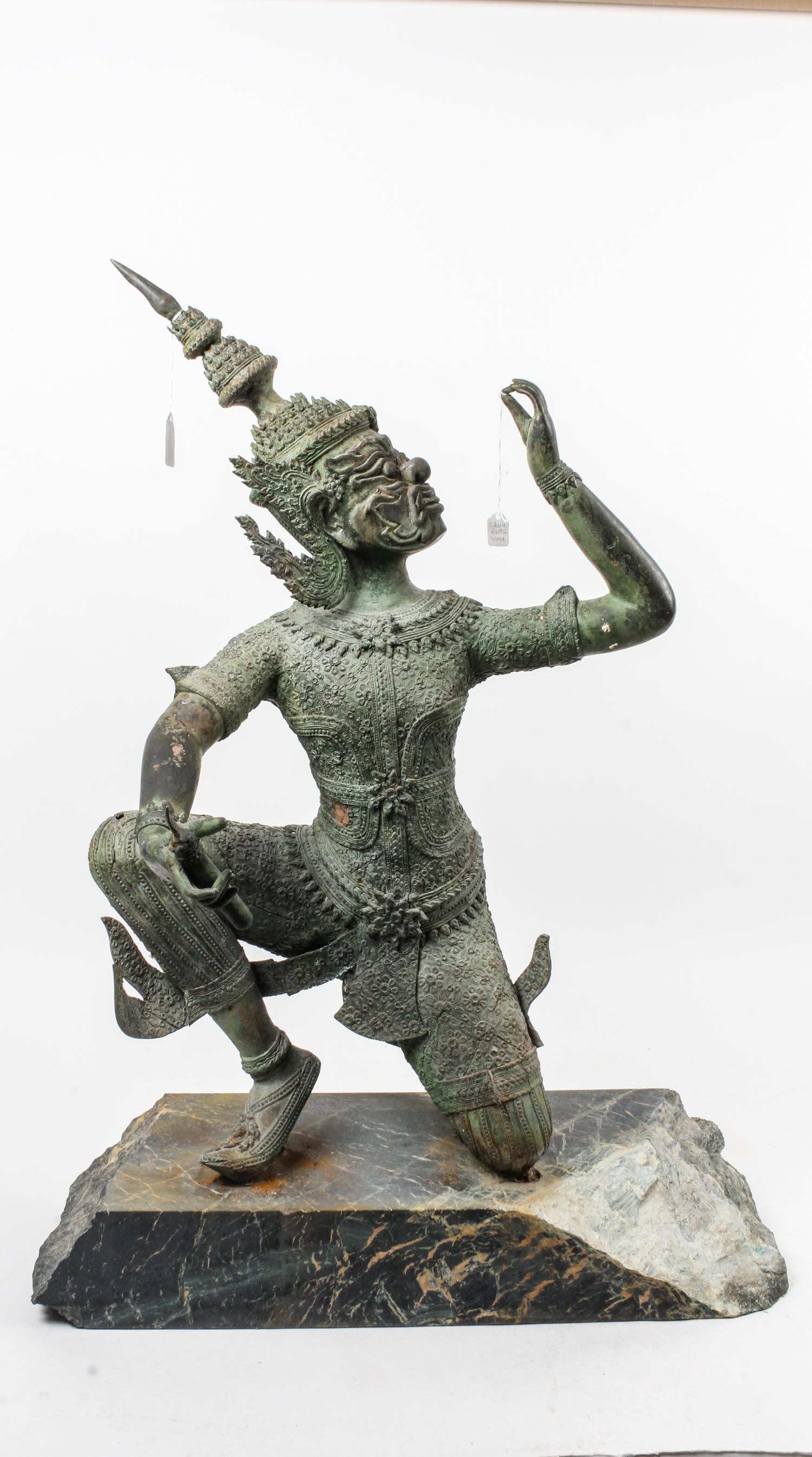 A South East Asian Cast Metal Figure Height of figure 28 3/4 inches.