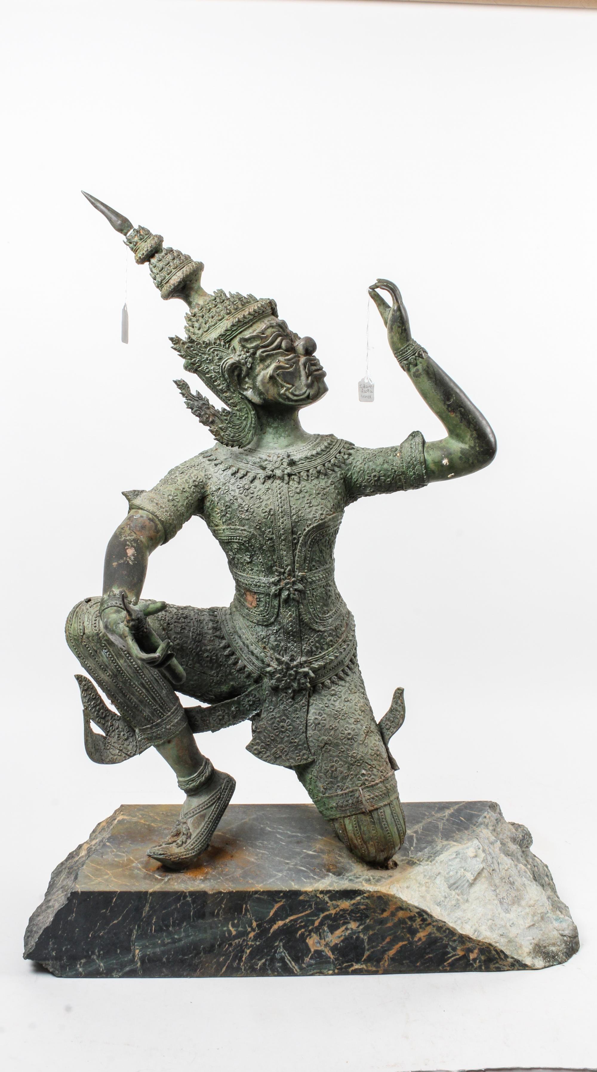 A South East Asian Cast Metal Figure Height of figure 28 3/4 inches.