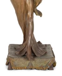 A Patinated Metal Figure of a Standing Maiden Mounted as a Lamp