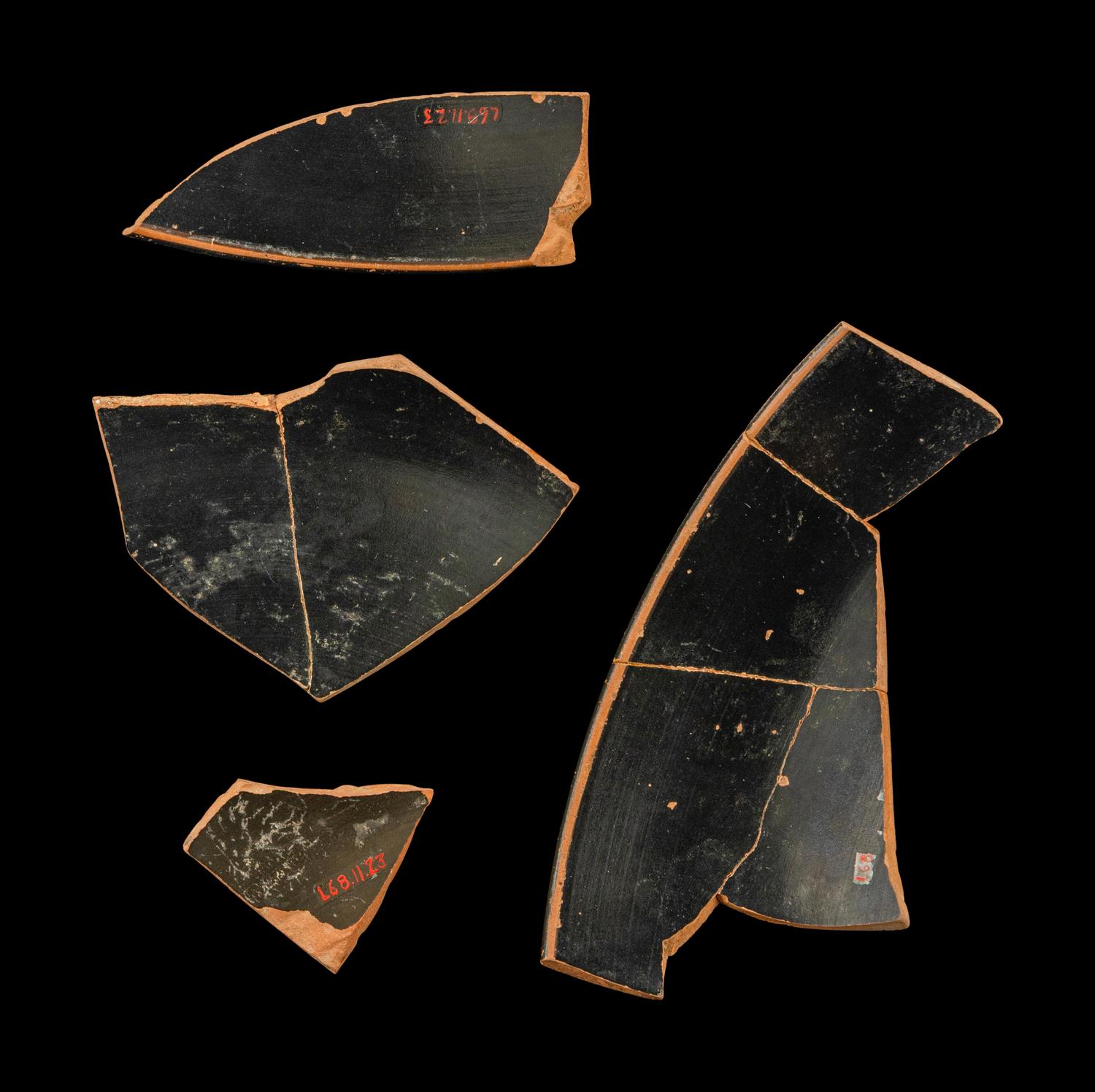Four Attic Black-Figured Eye Cup Fragments with a Maenad and Satyr