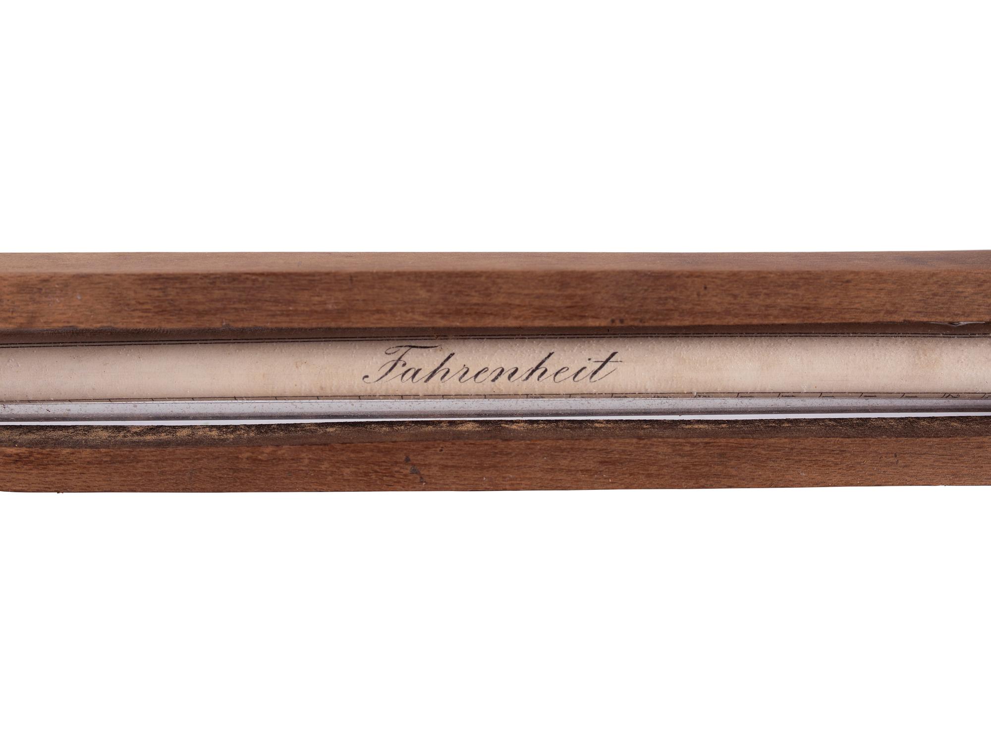 A Copper Tycos Candy Thermometer and a Wood Encased Floating Bath or Dairy Thermometer
