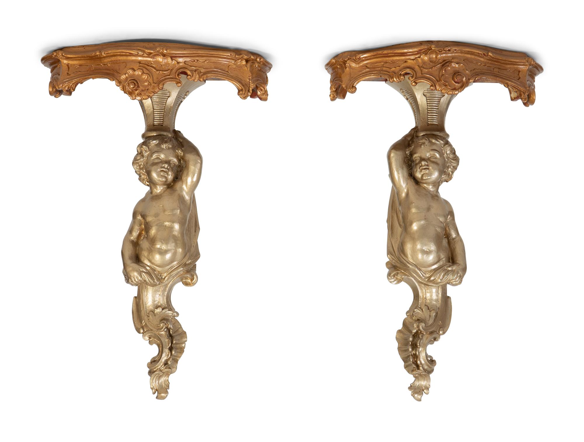 A Pair of Gilt and Silvered Wood Figural Wall Mount Console Brackets — 20TH CENTURY