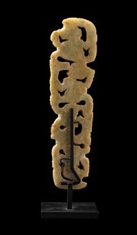 A Costa Rican White-Jade Snake and Monkey Pendant