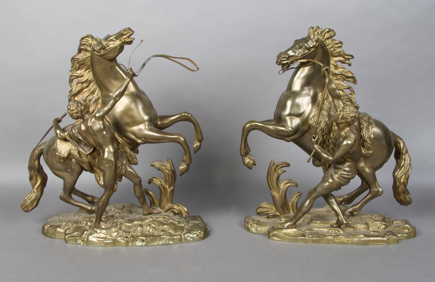 A Group of Two Bronze Marley Horses, After Coustou, Height of tallest 15 x width 12 inches.