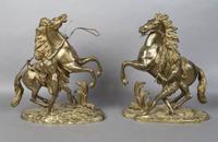 A Group of Two Bronze Marley Horses, After Coustou, Height of tallest 15 x width 12 inches.