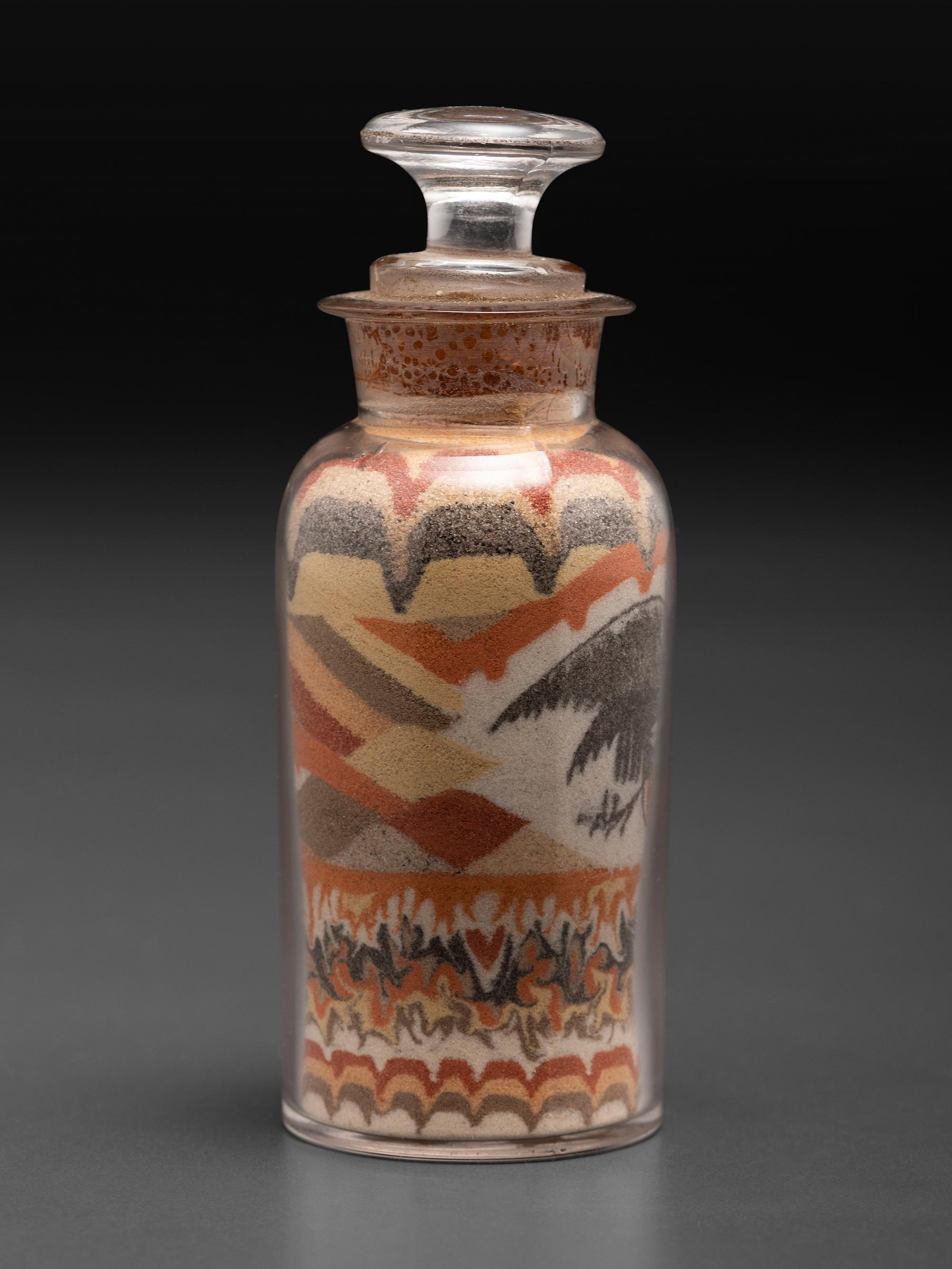 An Early Andrew Clemens (American, 1857-1894) Eagle Sand Bottle