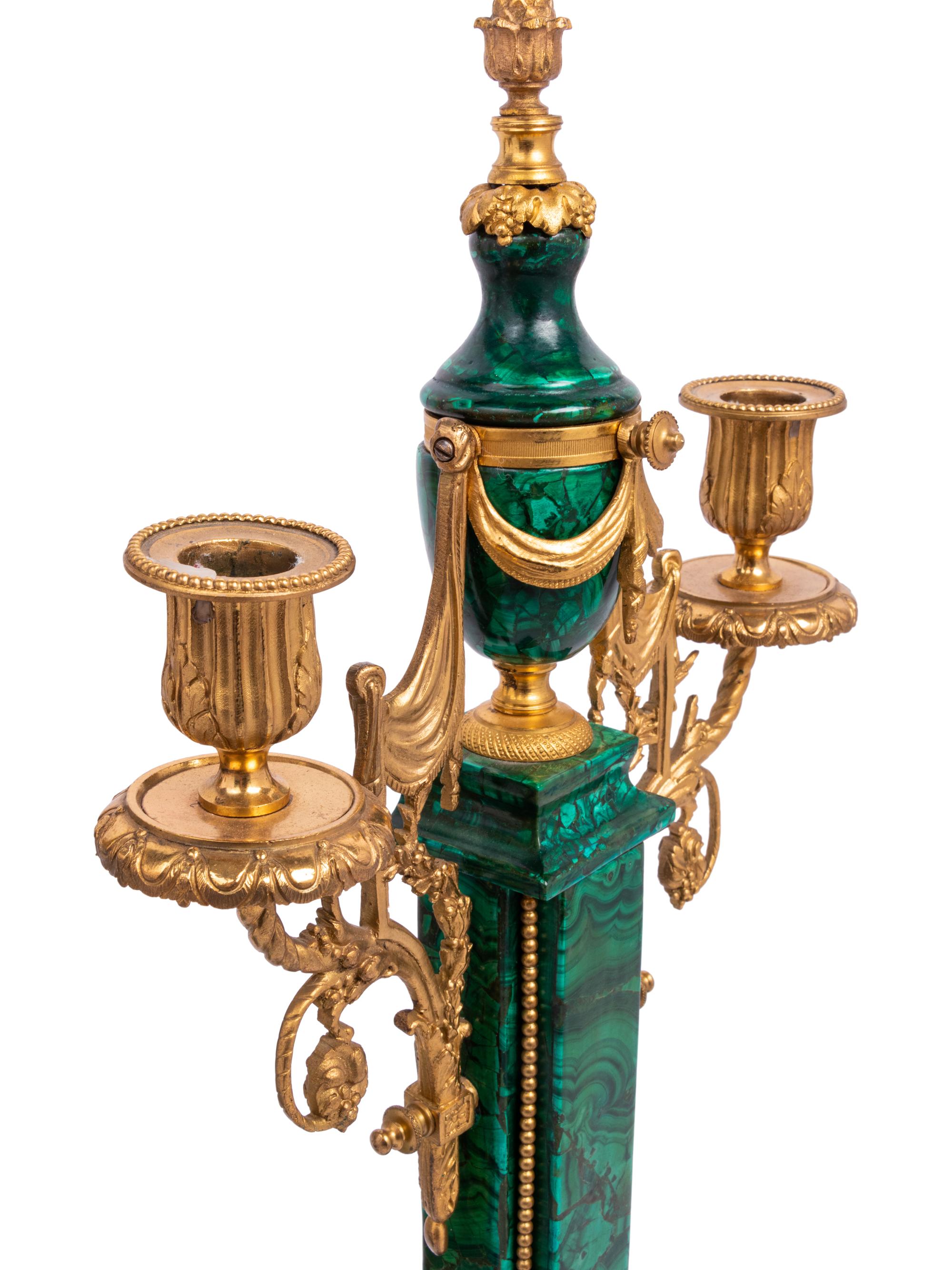 A Pair of Empire Style Gilt Metal and Malachite Veneered Two-Light Candelabra