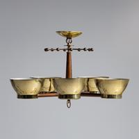 Group of Four Brass Modernist Five-Light Chandeliers
