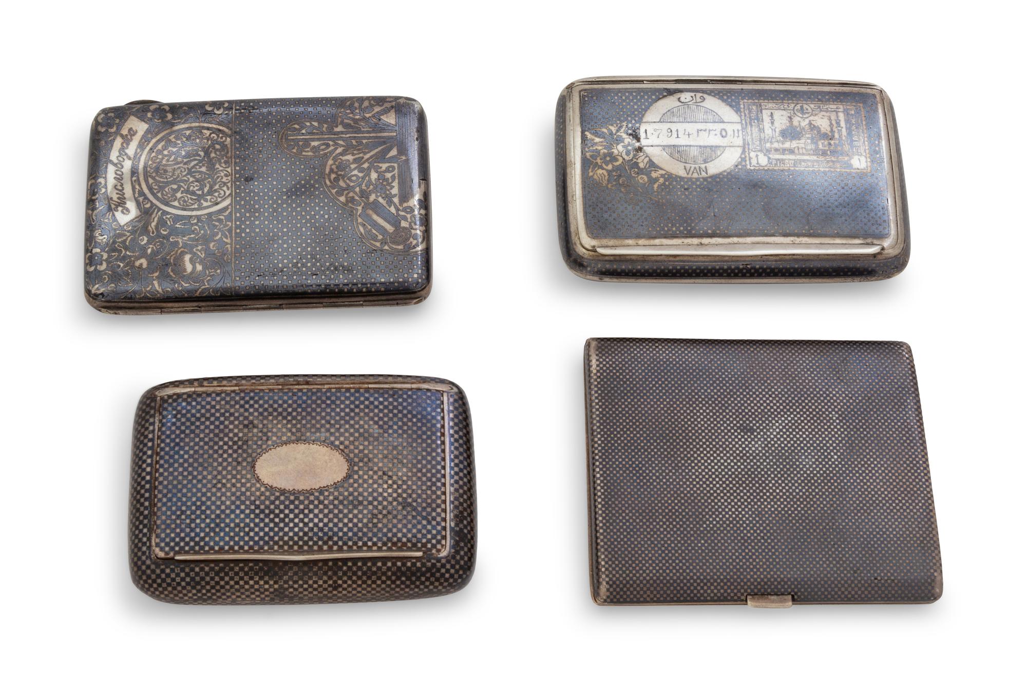 Four Middle Eastern Silver Cigarette Cases