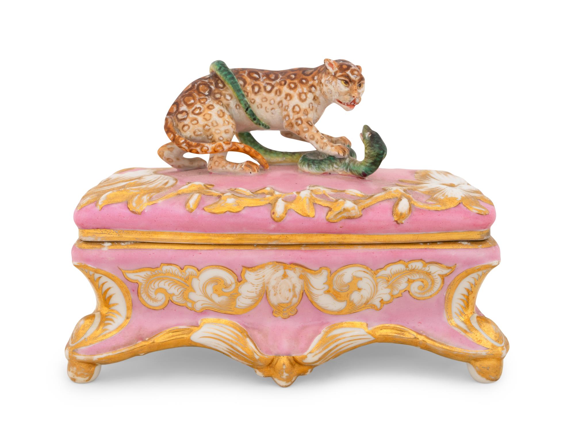 A Continental Porcelain Painted and Parcel Gilt Trinket Box