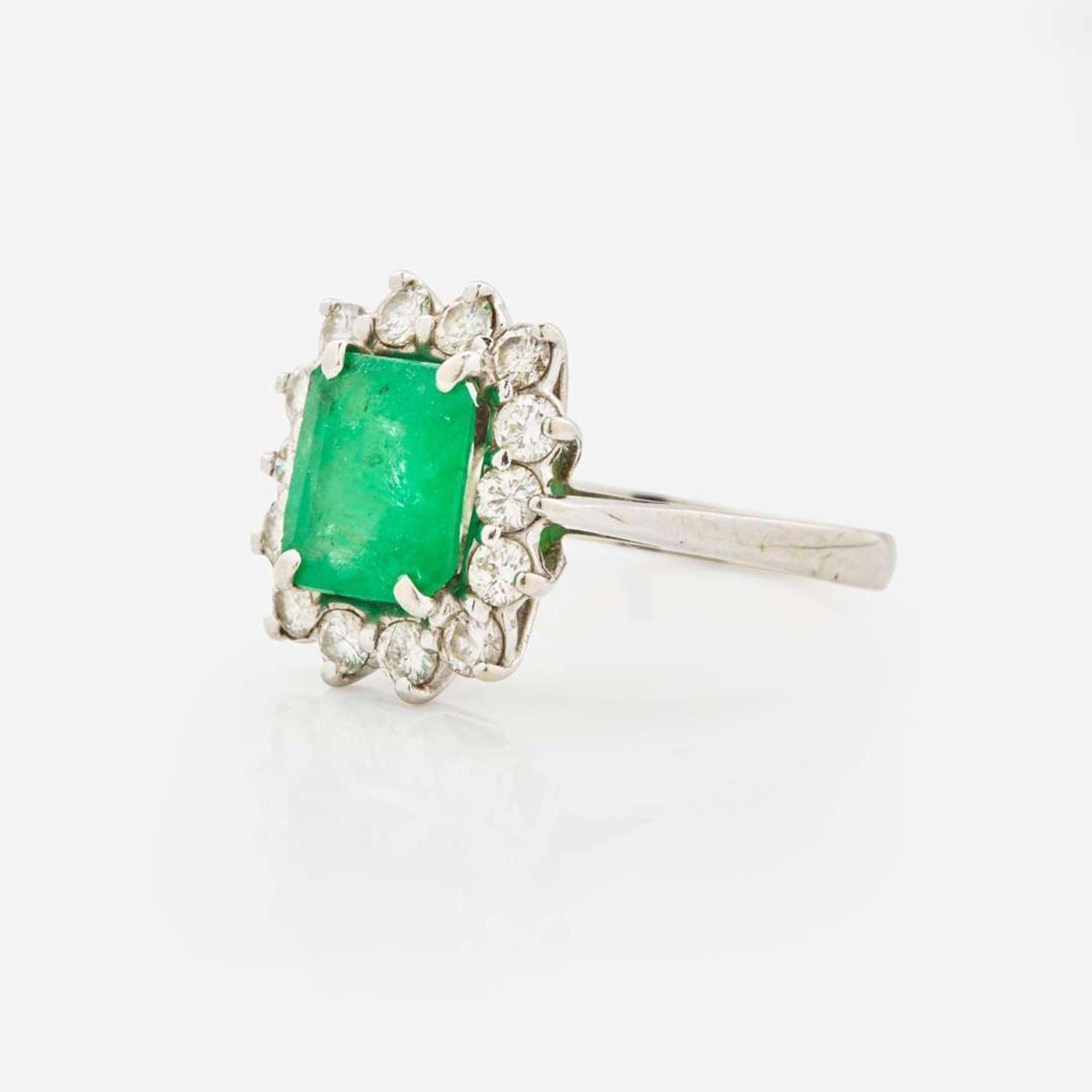 A 14K White Gold, Emerald, and Diamond Ring