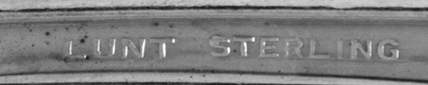 An American Silver Flatware Service, Lunt Silversmiths, Greenfield, MA, comprising: 12 dinner knives 5 dinner forks 11 luncheon forks 1