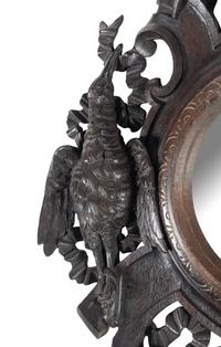 A Black Forest Carved Oak Game Trophy Mirror