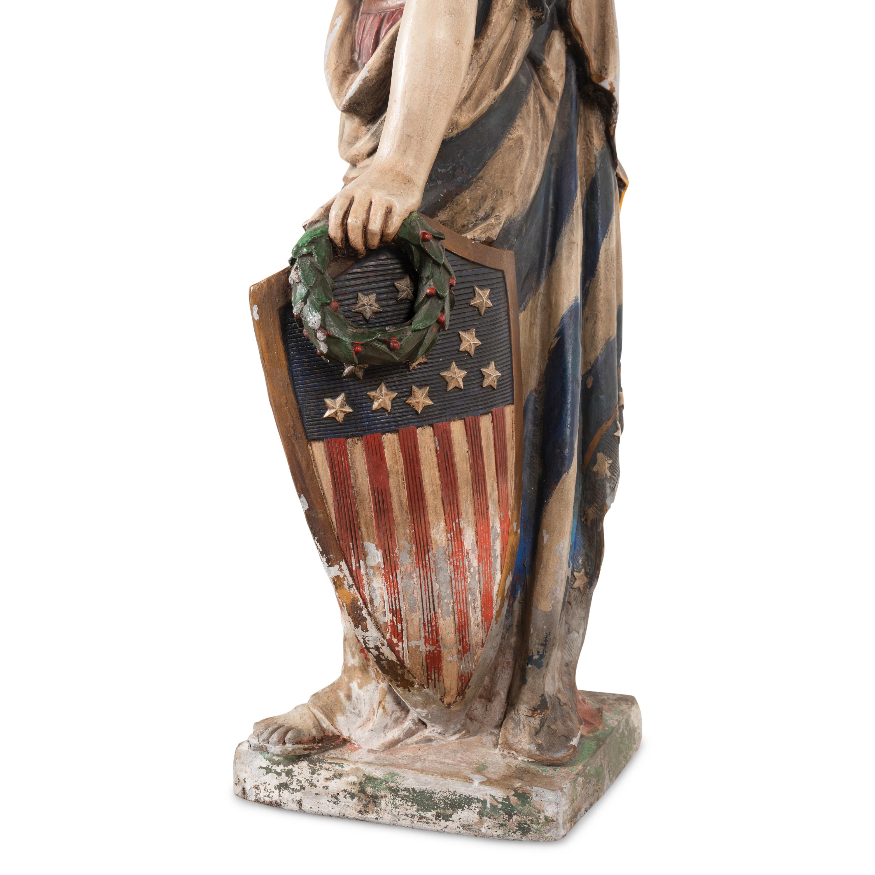 A Polychrome Painted Cast Zinc Goddess of Liberty Figure