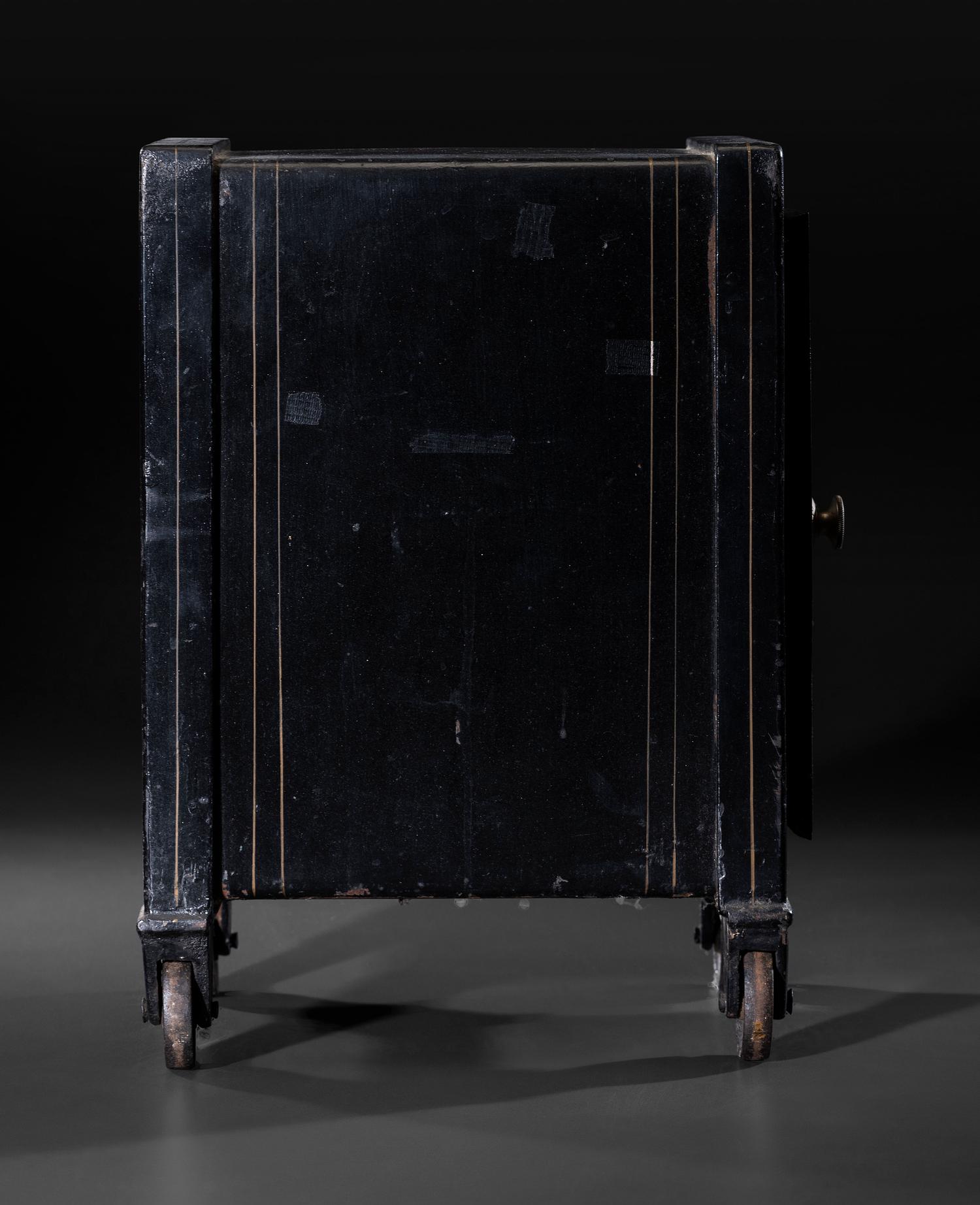 A Paint Decorated Cast Iron Safe, Marked G. Steinbrenner