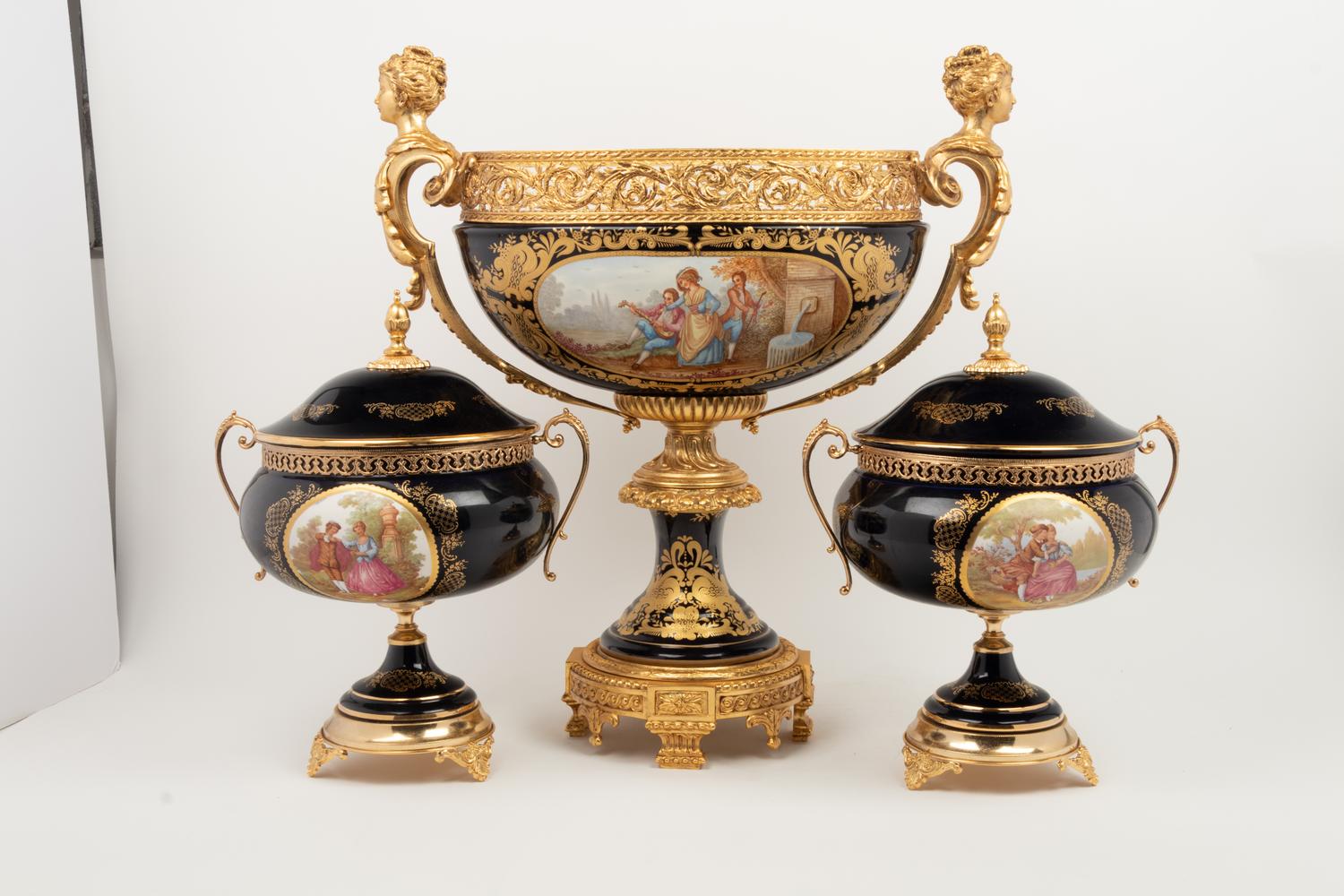 A Louis XV Limoges Style Gilt Bronze Mounted Porcelain Table Garniture