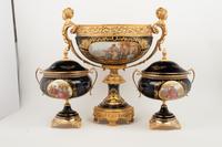 A Louis XV Limoges Style Gilt Bronze Mounted Porcelain Table Garniture