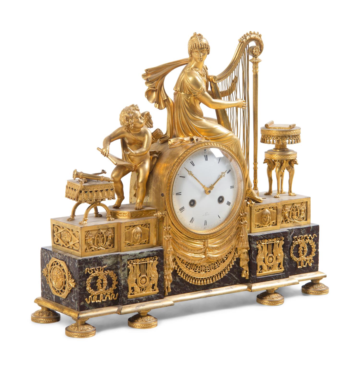 An Empire Gilt Bronze and Marble Figural Mantel Clock