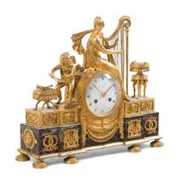 An Empire Gilt Bronze and Marble Figural Mantel Clock