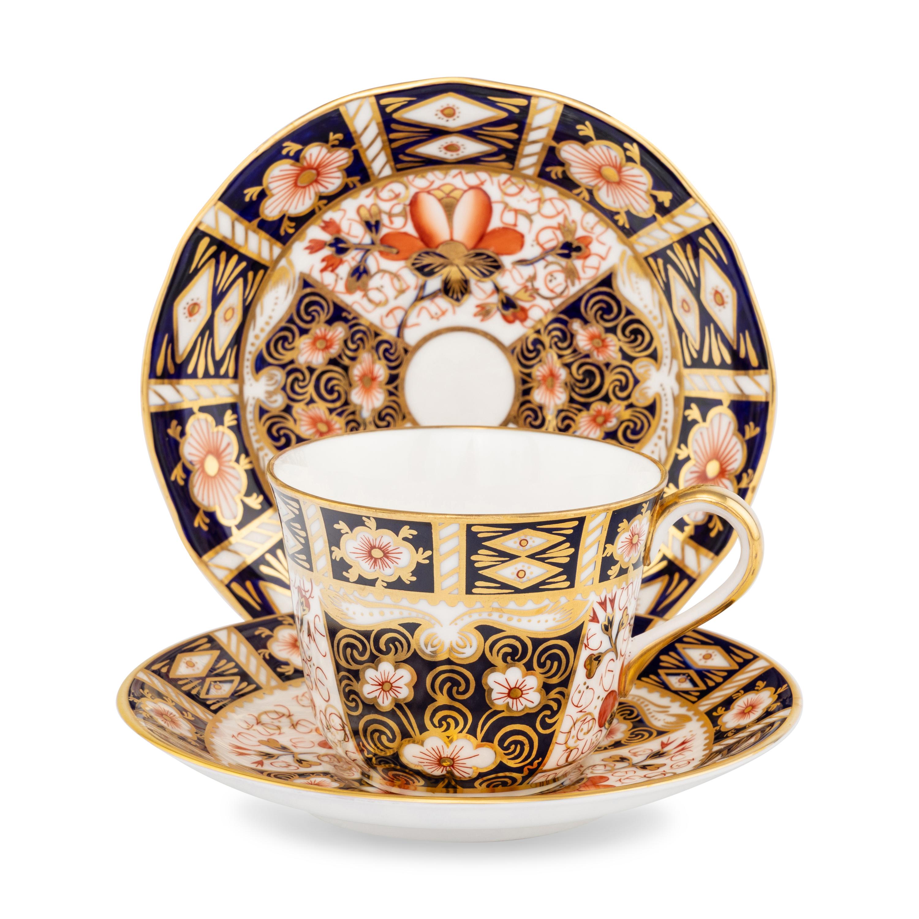 A Group of Royal Crown Derby Porcelain Teacups and Saucers