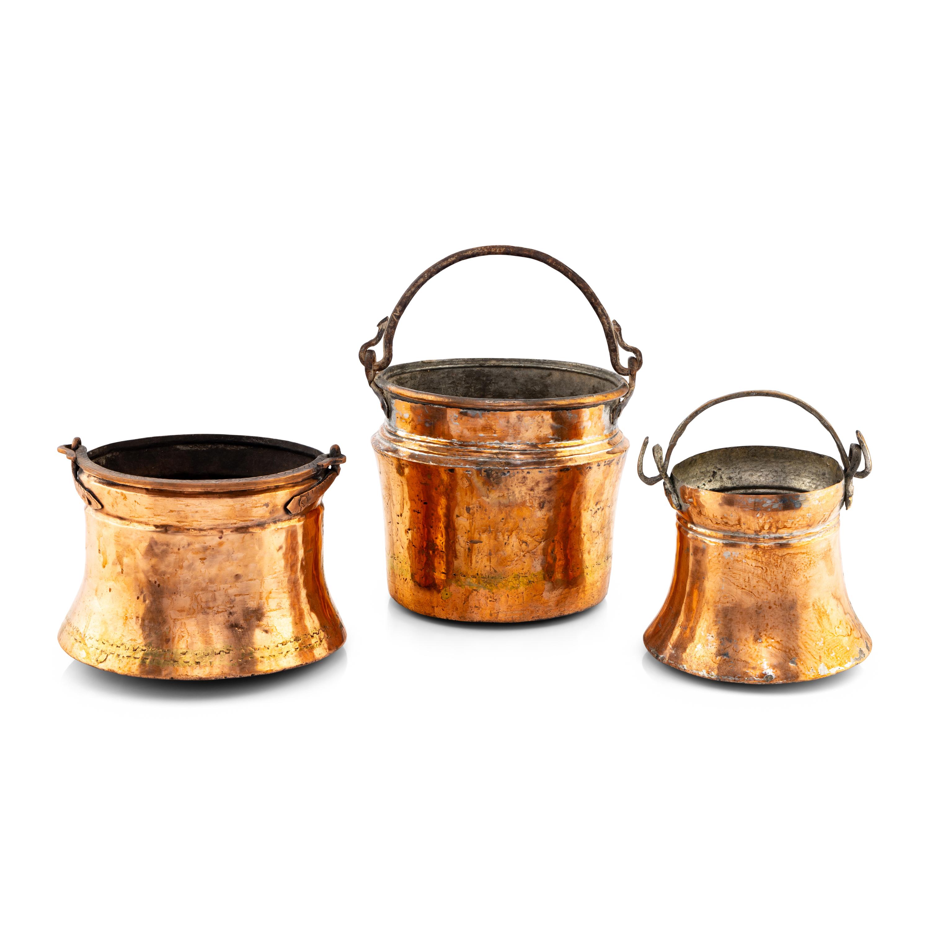 A Set of Three Copper Pails
