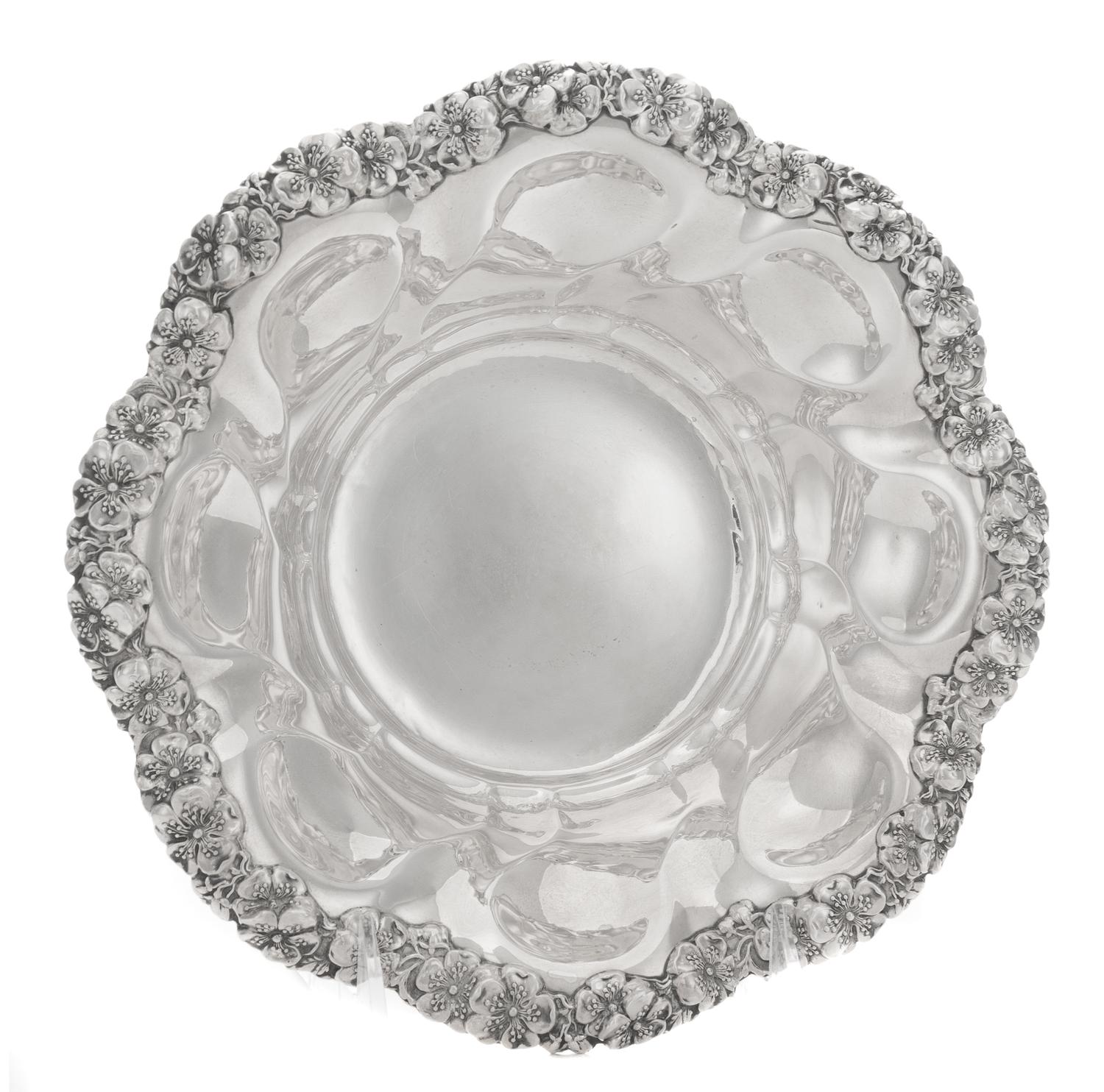 An American Silver Bowl, Alvin Mfg. Co., Providence, RI, with a band of applied flowers at the rim.