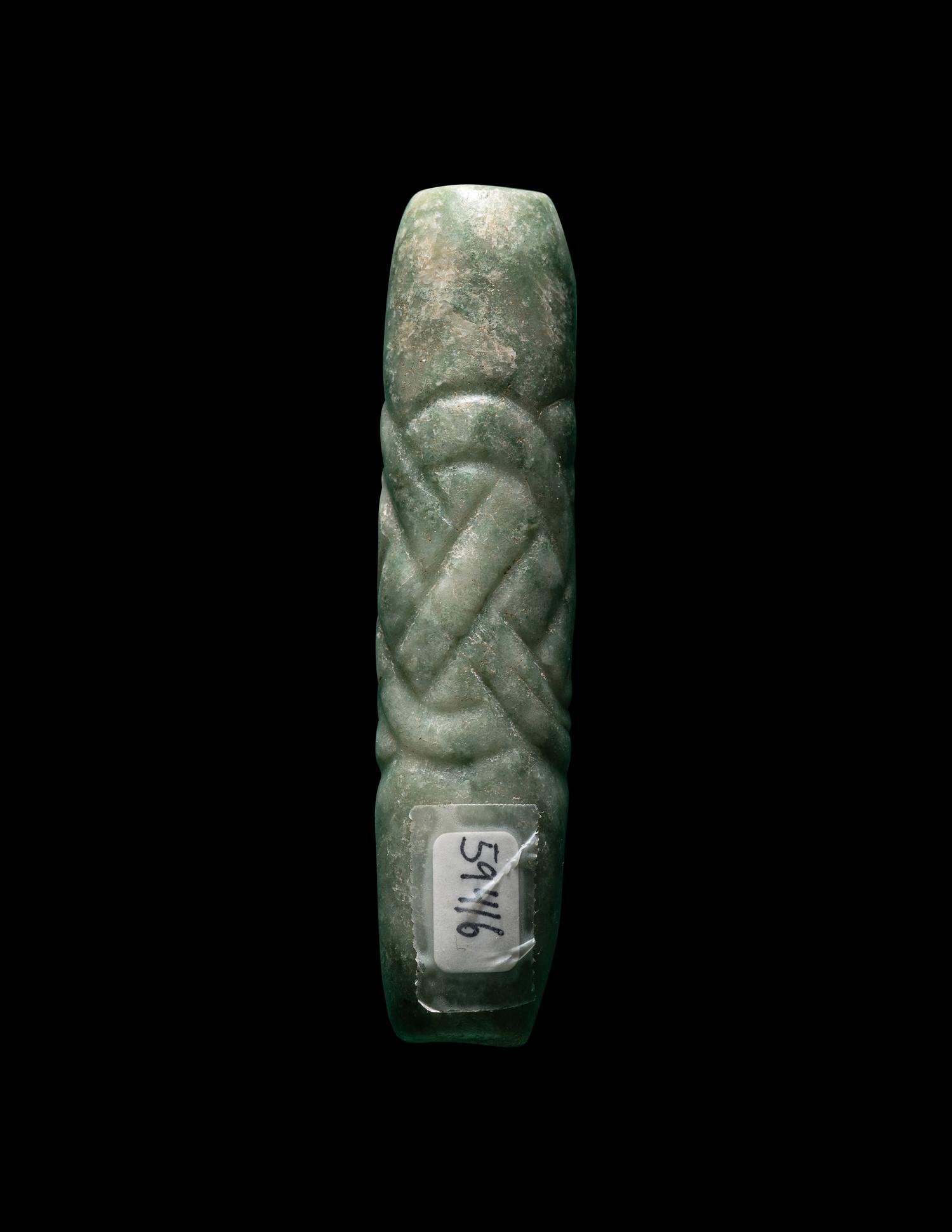 A Maya Jade Glyph Pendant