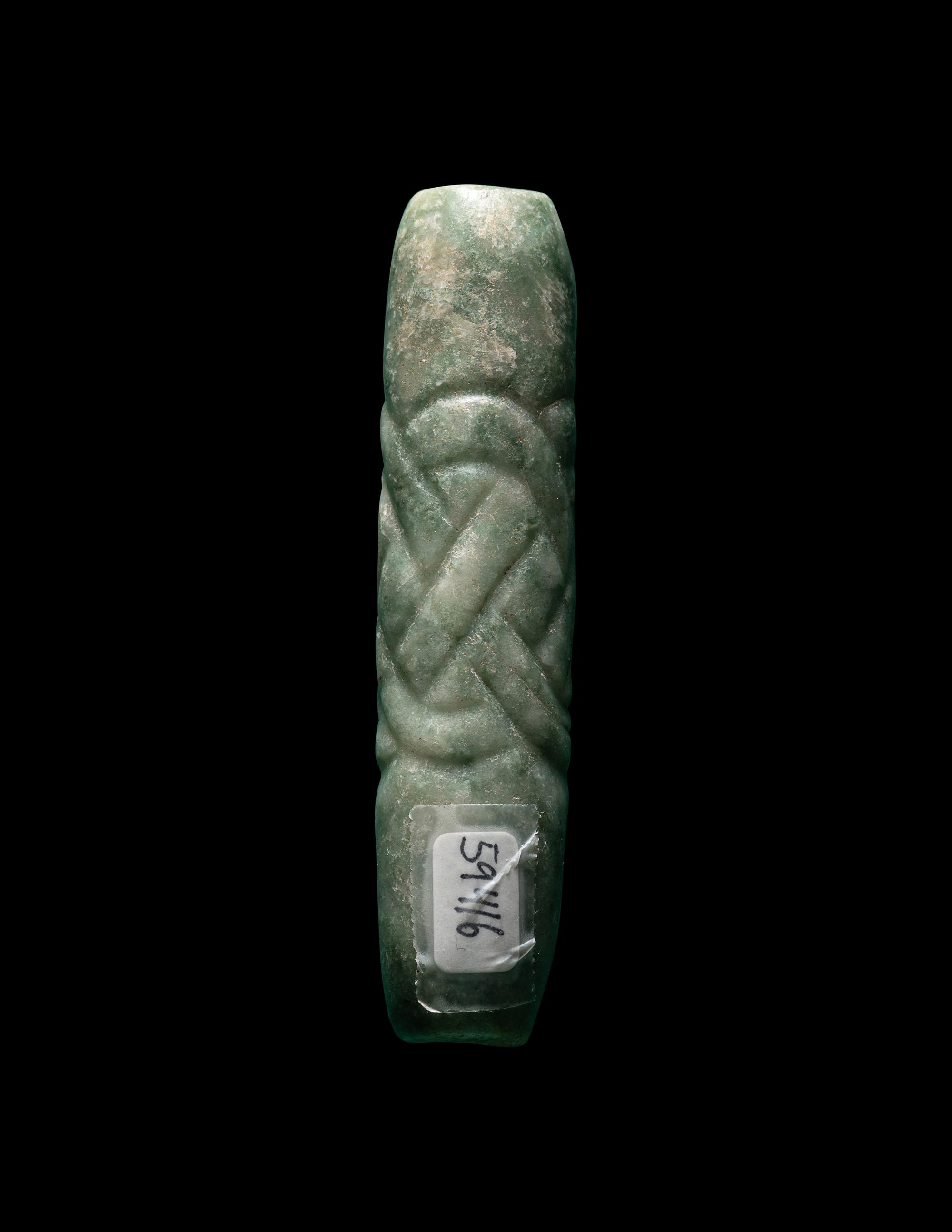 A Maya Jade Glyph Pendant