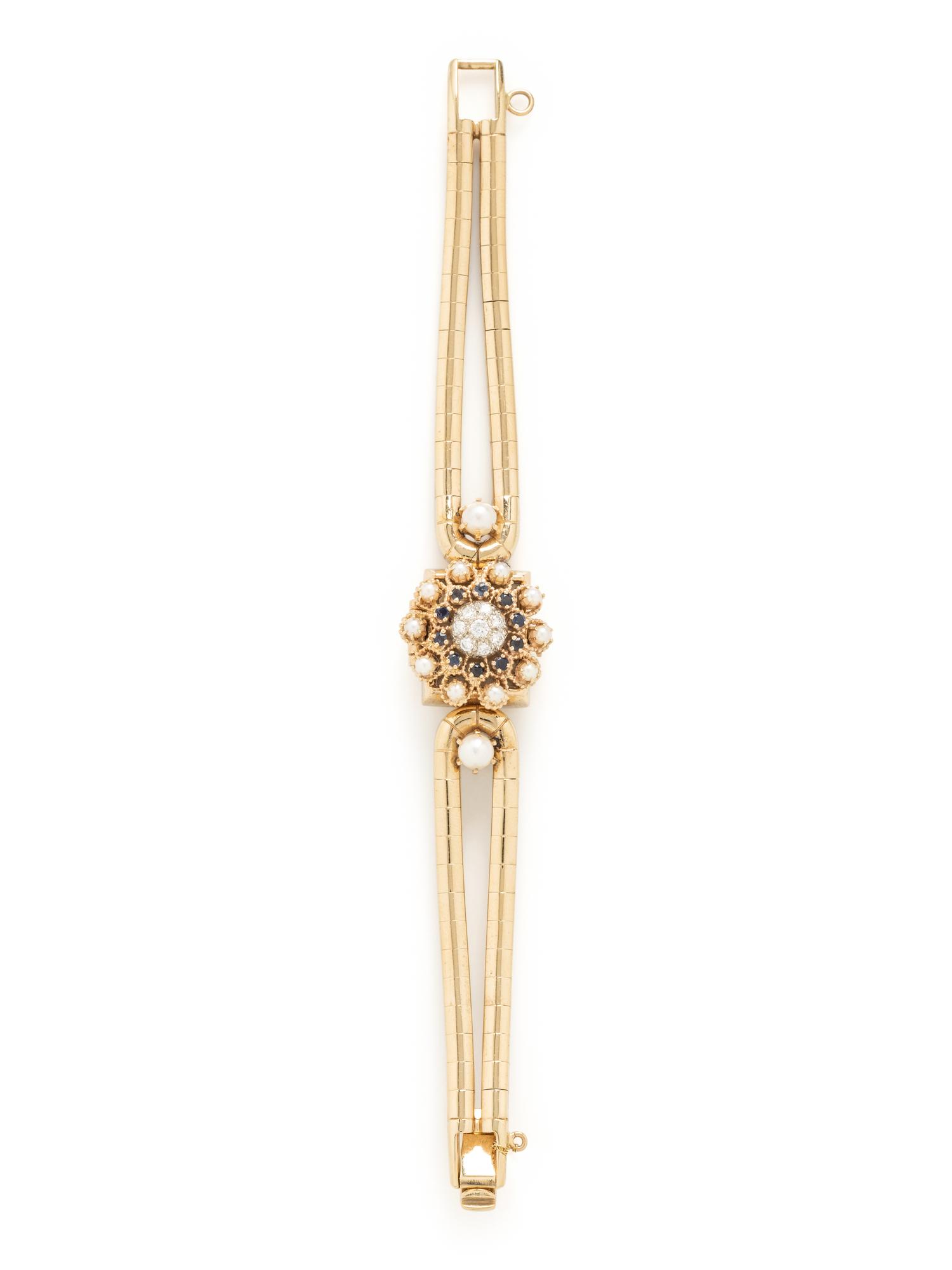 TOURNEAU, YELLOW GOLD, DIAMOND, SAPPHIRE AND CULTURED PEARL SURPRISE WATCH