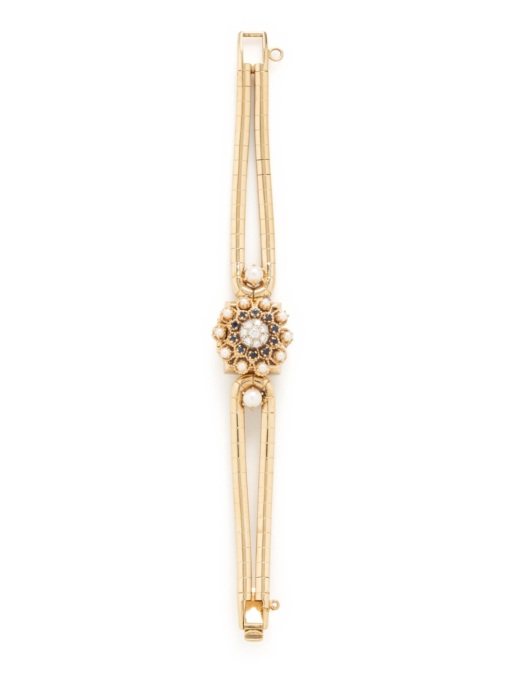 TOURNEAU, YELLOW GOLD, DIAMOND, SAPPHIRE AND CULTURED PEARL SURPRISE WATCH
