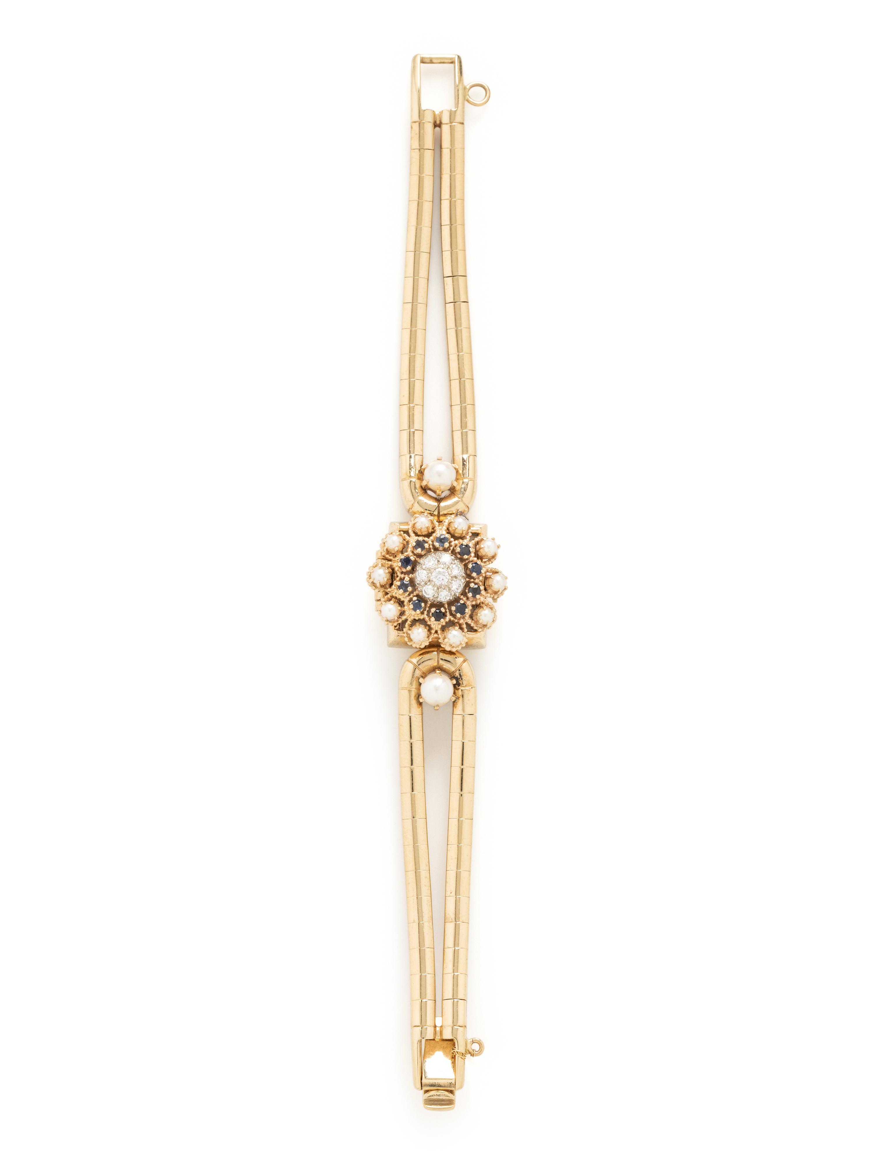 TOURNEAU, YELLOW GOLD, DIAMOND, SAPPHIRE AND CULTURED PEARL SURPRISE WATCH