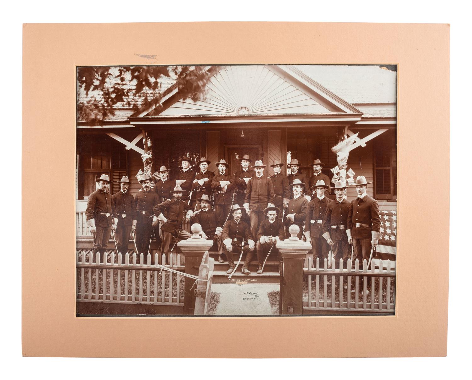 [SPANISH-AMERICAN WAR]. WALKER, W.G., photographer. Photograph of members of the Wyoming (Alger) Light Artillery. Cheyenne, WY.