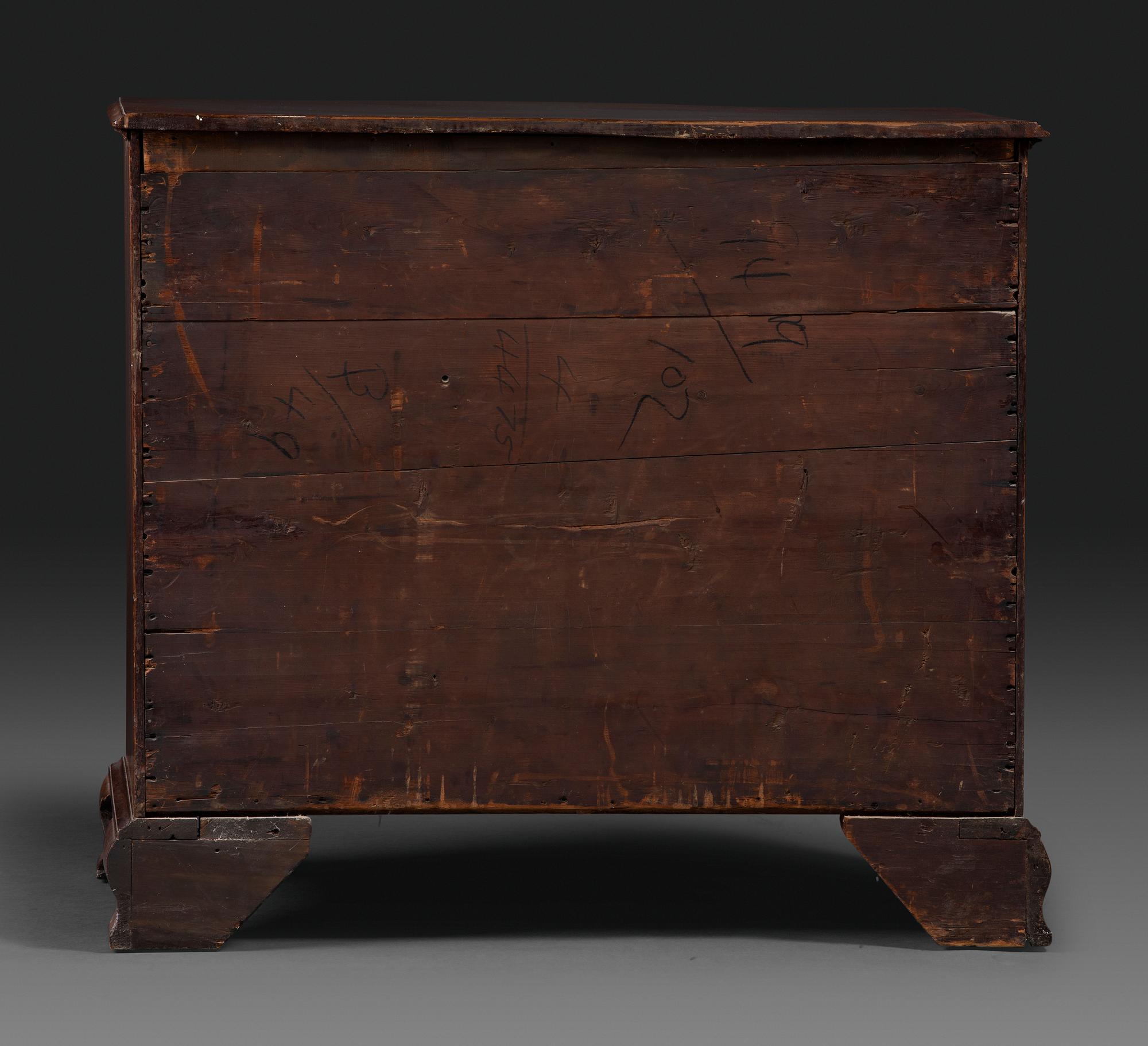 A Chippendale Figured Mahogany Serpentine Chest of Drawers