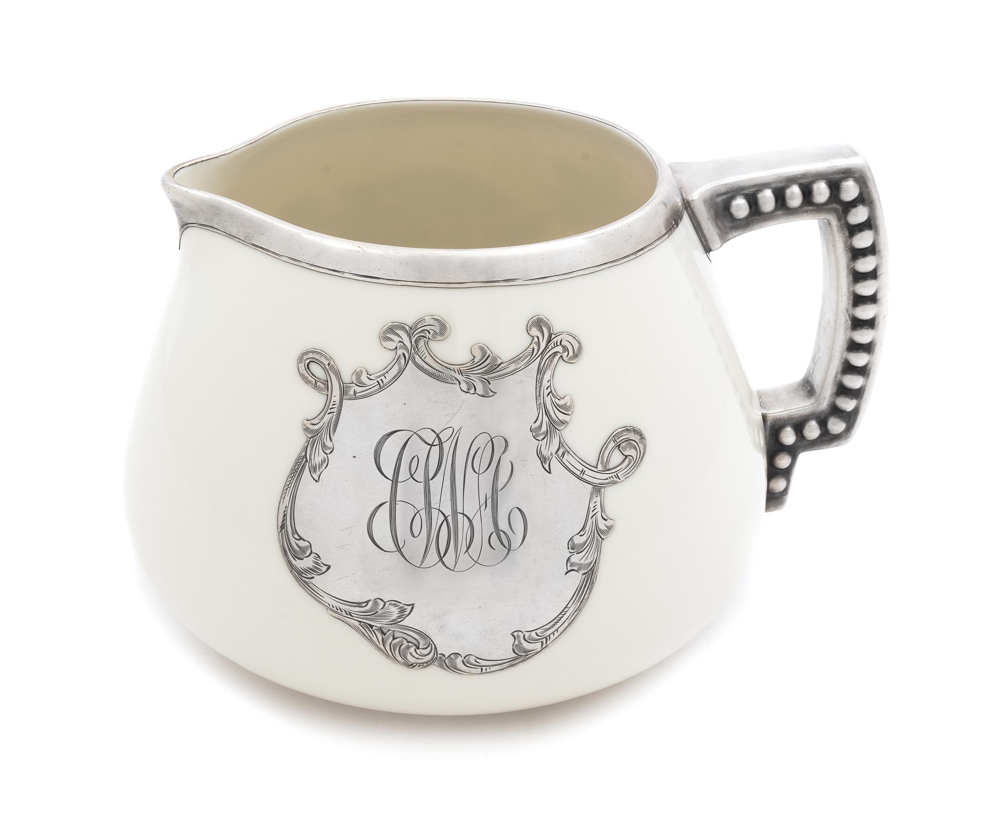 A Lenox Silver Overlay Pitcher Height 5 7/8 inches.
