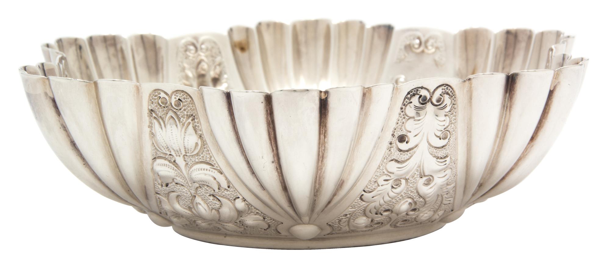 A Victorian Silver Bowl, Atkin Brothers, London, 1889, with fluted sides chased with foliate scrolls.