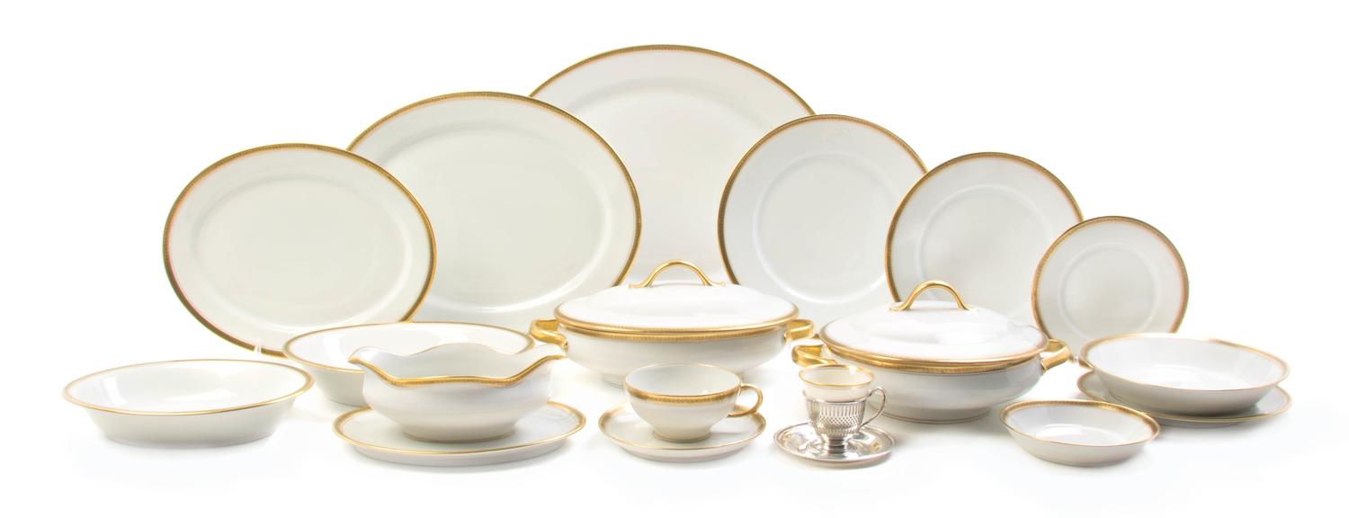 A Limoges Porcelain Partial Dinner Service, Diameter of dinner plate 9 3/4 inches.