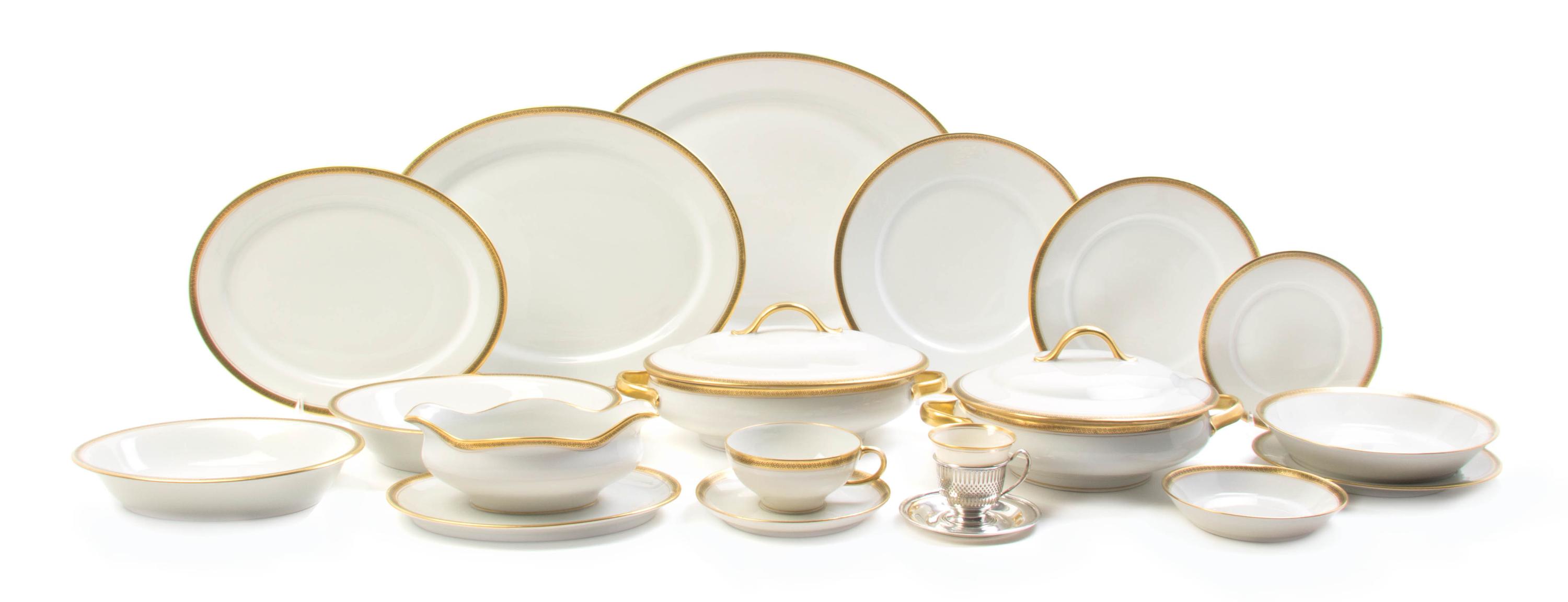 A Limoges Porcelain Partial Dinner Service, Diameter of dinner plate 9 3/4 inches.