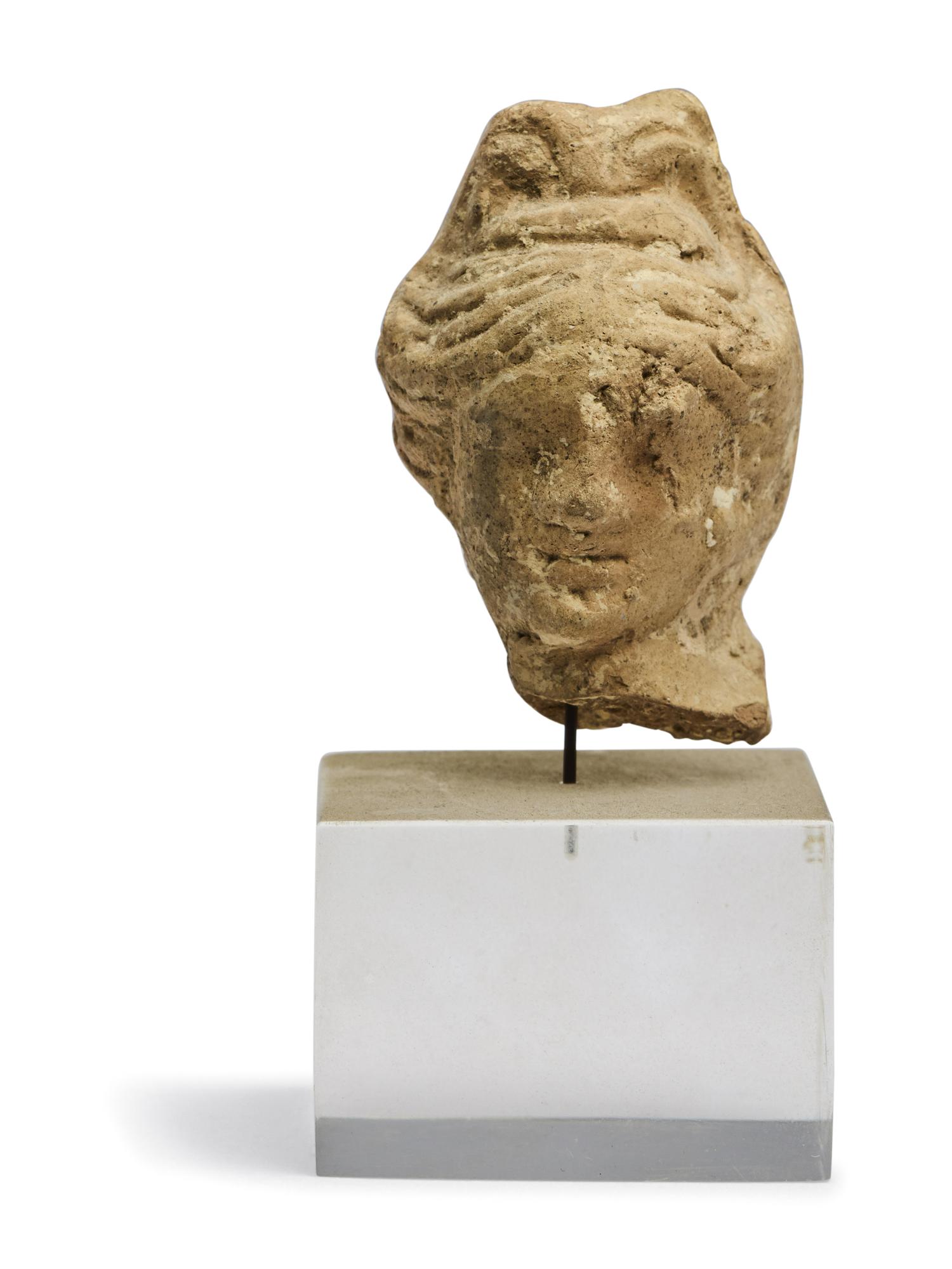 A Greek Terracotta Female Head