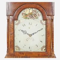 A Chippendale carved tiger maple tall case clock The face / works early 19th century, the case 20th century