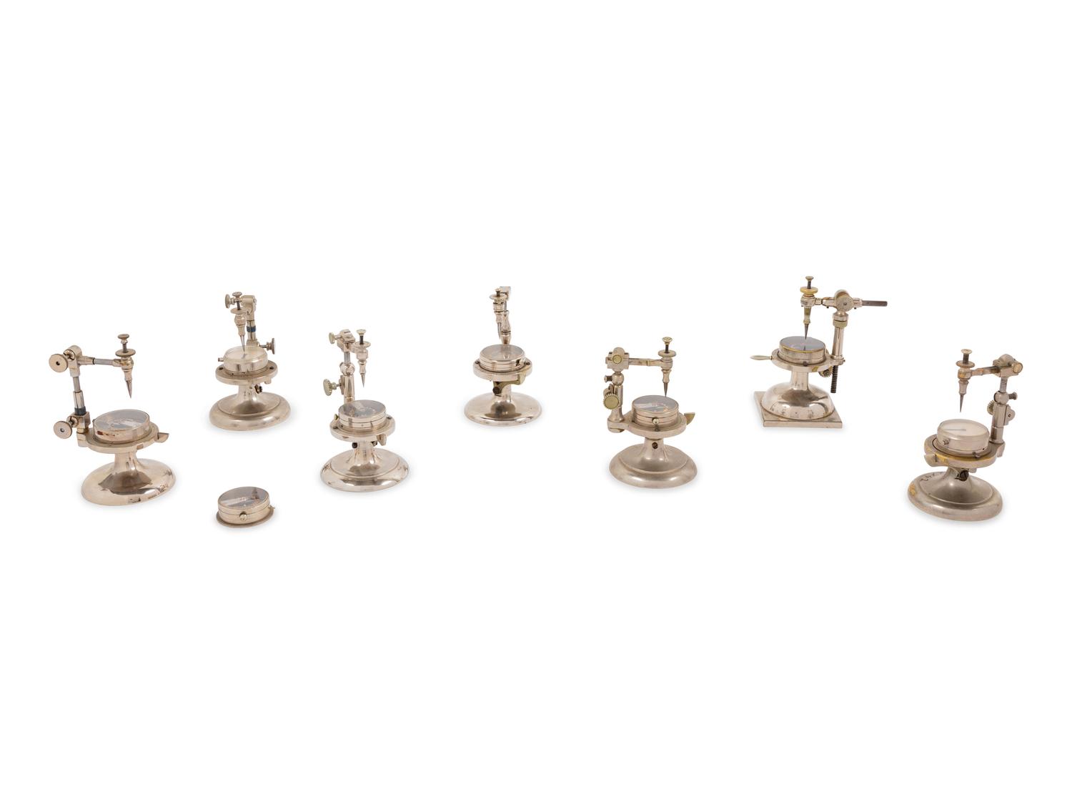 A Collection of Seven Watch Maker's Hairspring Vibrating Tools