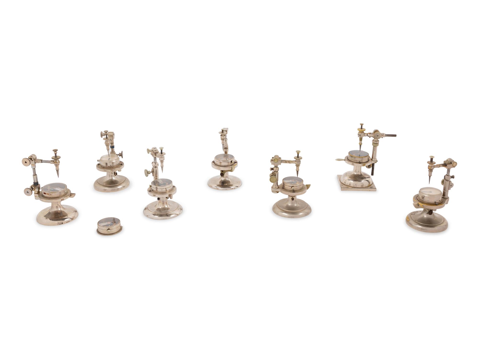 A Collection of Seven Watch Maker's Hairspring Vibrating Tools