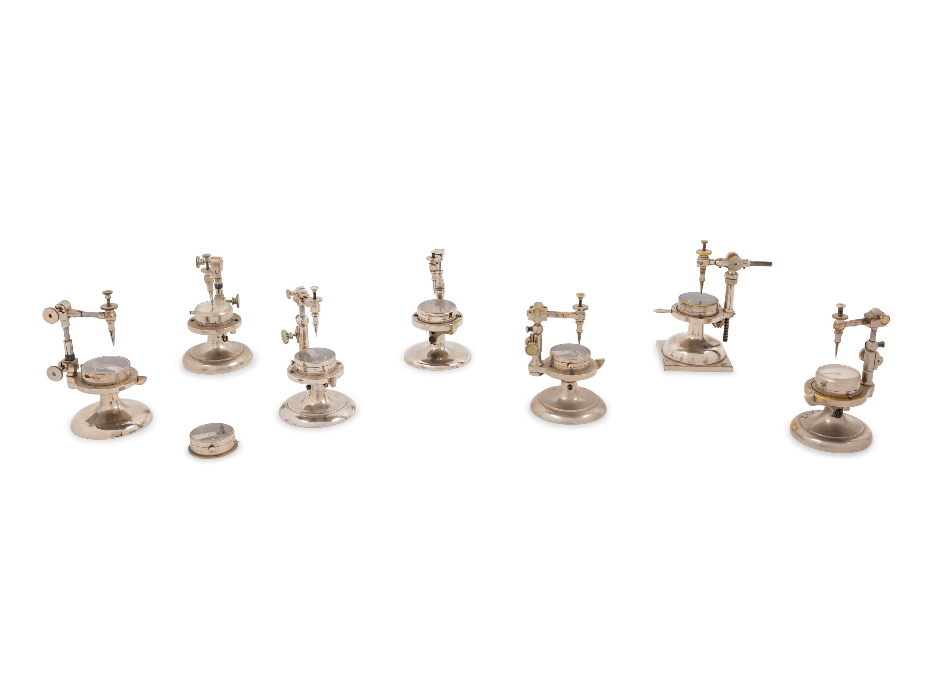 A Collection of Seven Watch Maker's Hairspring Vibrating Tools
