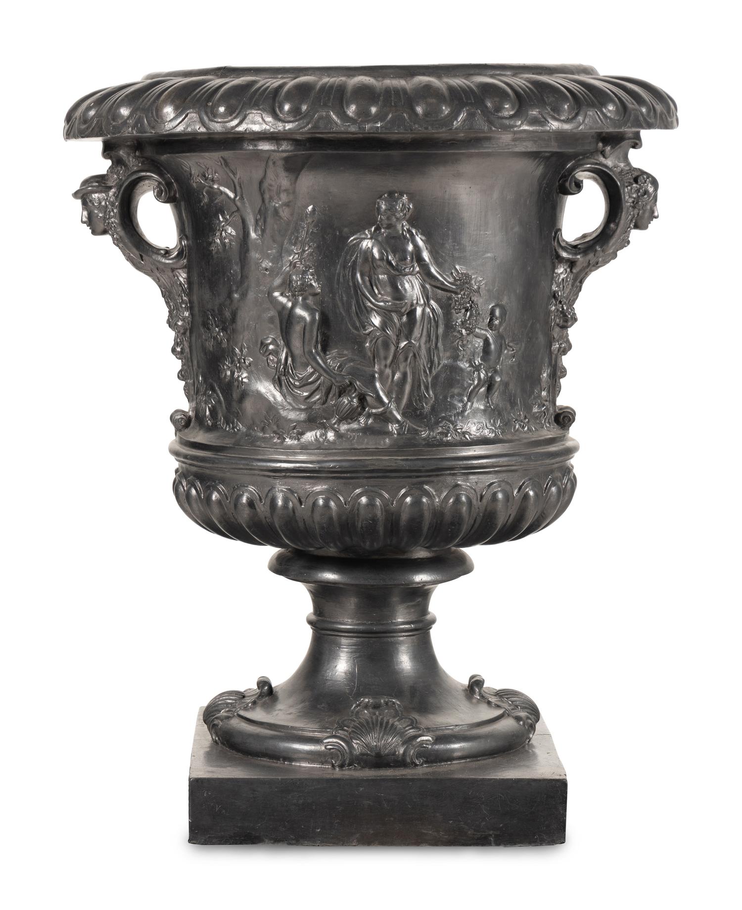 A Pair of English Lead Allegorical Garden Urns
